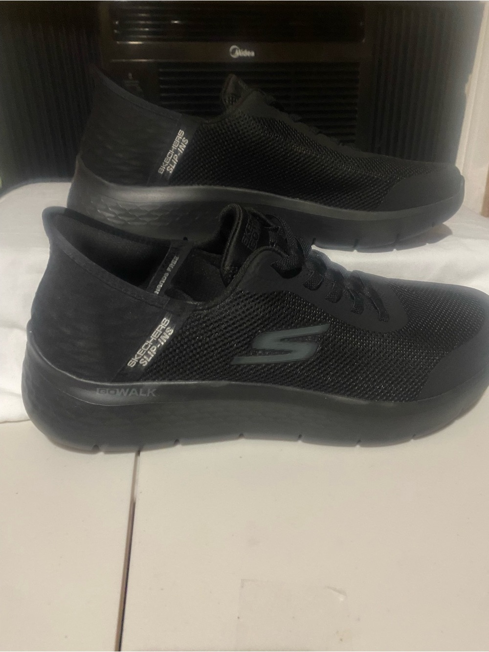 Skechers Men’s Black Mesh Slip-On GOwalk Sneakers